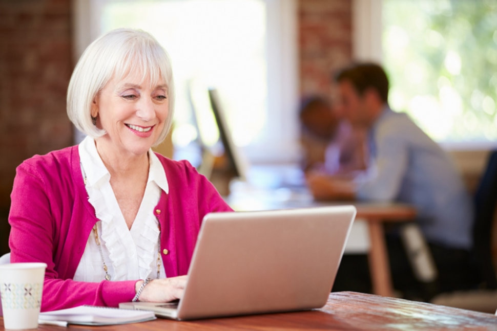 older woman with laptop